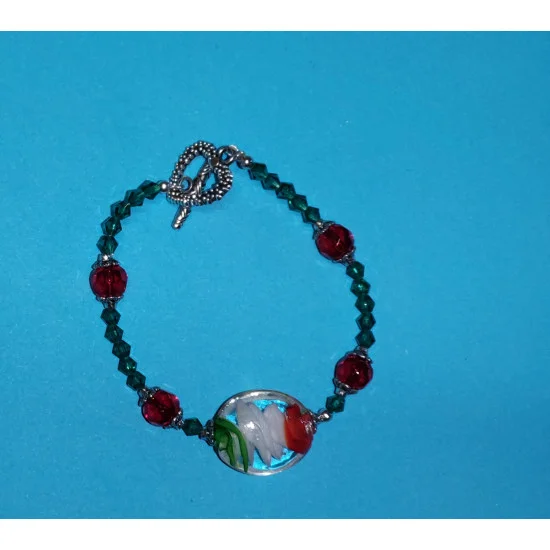 Bratara cca 21 cm din  margele sticla lampwork( oval ), cristale sticla fatetate  rosu transparent