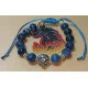Bratara sodalit cu margele metalice Budha. Confectionat pe sarma siliconata , margele  6 mm sodalit cu margele metalice argintii budha si  distantiert argint tibetan. Inchizatoare snur cerat. Marime cca 18-24 cm.