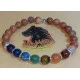Bratara 7 chakre cu accesorii placate cu argint. Bratara pe elastic sau sarma siliconata cu incuietoare lobster placat cu argint, din diferite margele semipretioase 8 sau 6 mm si 7 chakre: carneol, jad portocaliu, ochi de tigru, aventurin verde, jasp impe