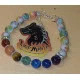 Bratara 7 chakre cu accesorii placate cu argint. Bratara pe elastic sau sarma siliconata cu incuietoare lobster placat cu argint, din diferite margele semipretioase 8 sau 6 mm si 7 chakre: carneol, jad portocaliu, ochi de tigru, aventurin verde, jasp impe