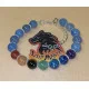 Bratara 7 chakre cu accesorii placate cu argint. Bratara pe elastic sau sarma siliconata cu incuietoare lobster placat cu argint, din diferite margele semipretioase 8 sau 6 mm si 7 chakre: carneol, jad portocaliu, ochi de tigru, aventurin verde, jasp impe