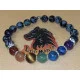 Bratara 7 chakre cu accesorii placate cu argint. Bratara pe elastic sau sarma siliconata cu incuietoare lobster placat cu argint, din diferite margele semipretioase 8 sau 6 mm si 7 chakre: carneol, jad portocaliu, ochi de tigru, aventurin verde, jasp impe